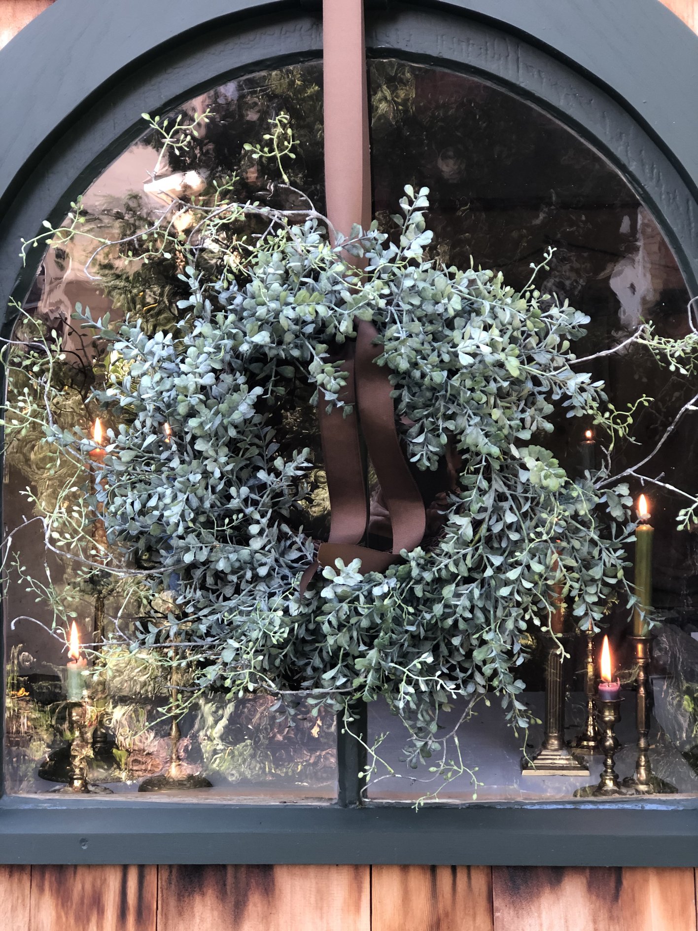 Faux boxwood wreath on front door