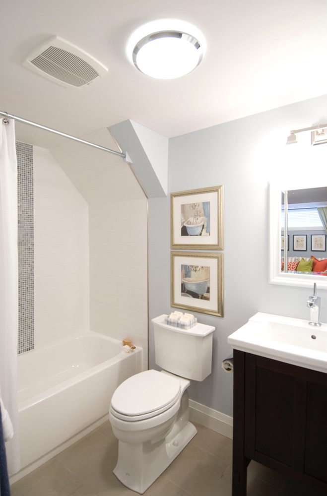 Light blue bathroom with ceiling vent