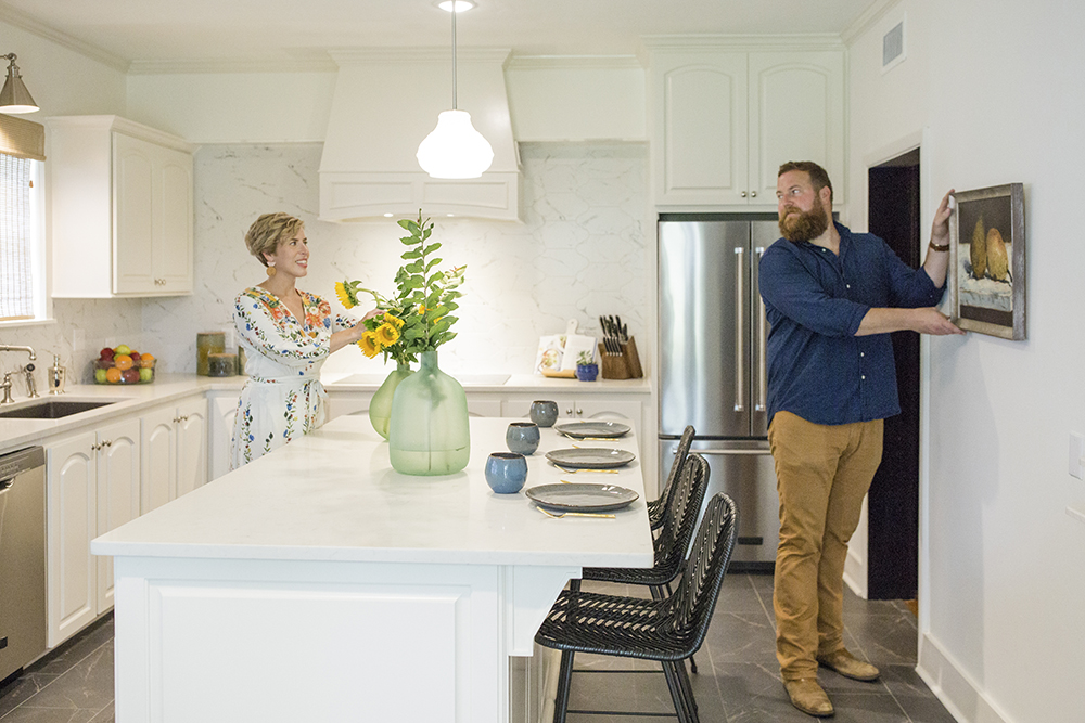 Erin and Ben Napier styling the new white kitchen