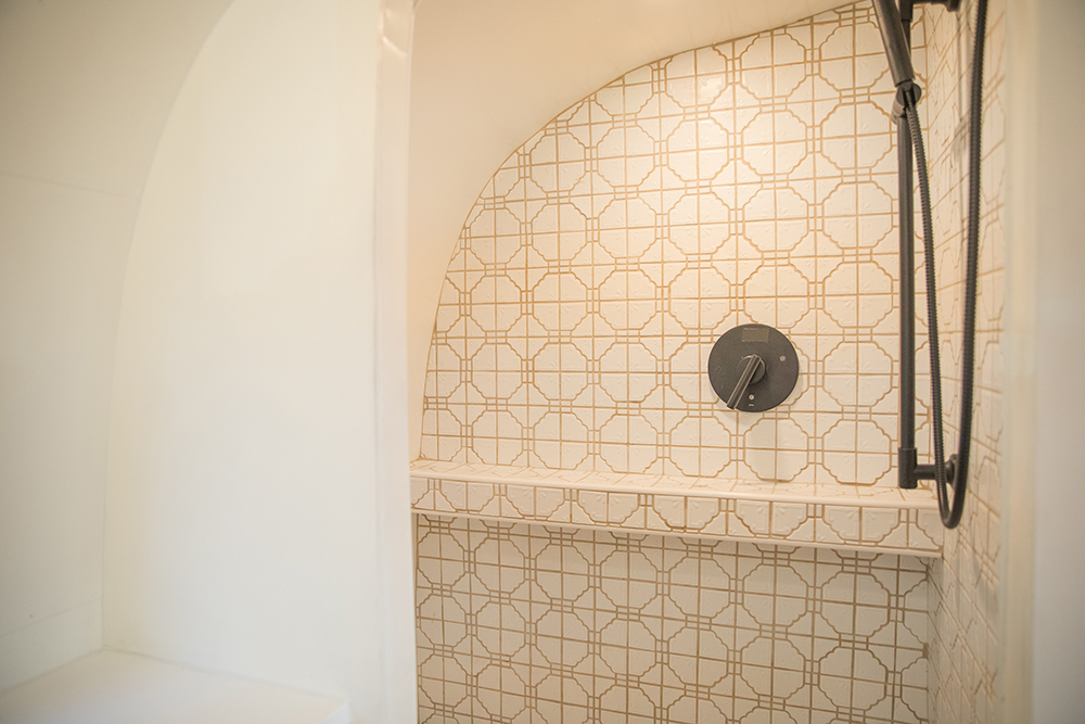 A vintage-inspired geometric tiled shower