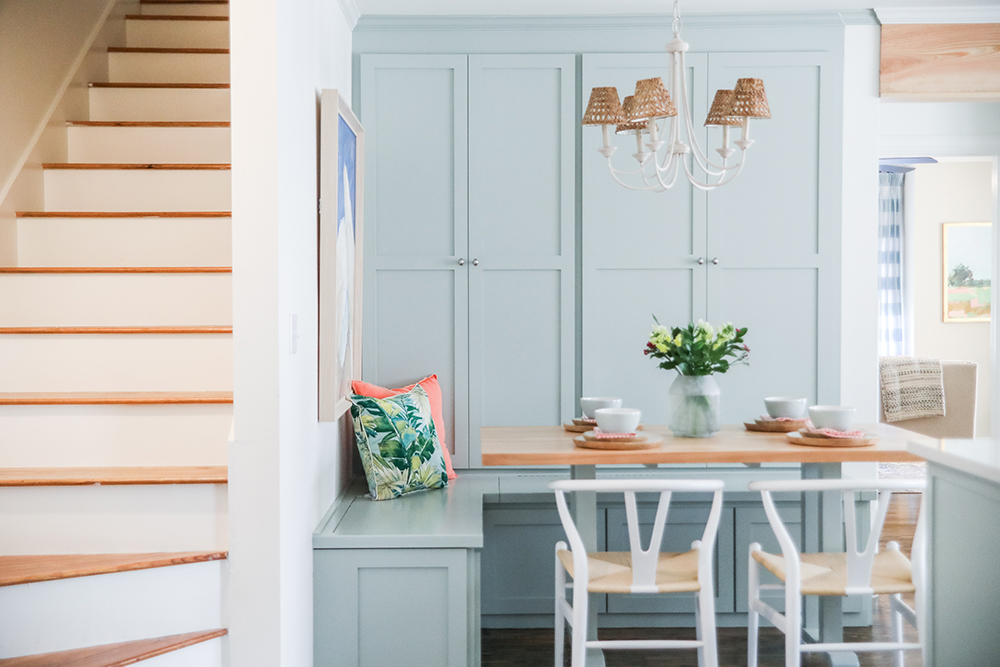 Breakfast nook with ocean blue walls with panelling