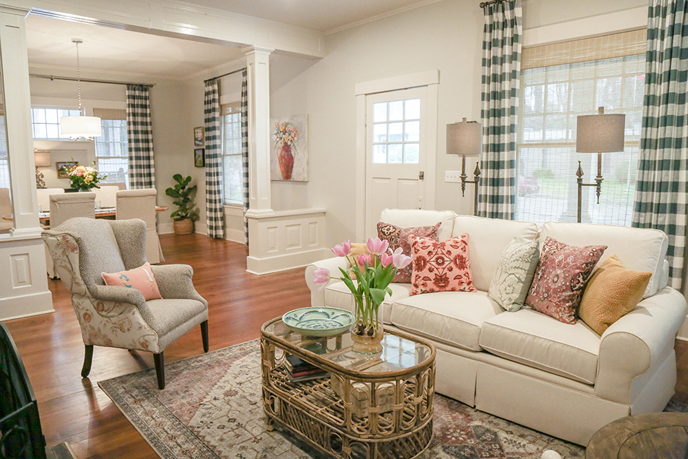 Feminine living room with peach, pink and green accents