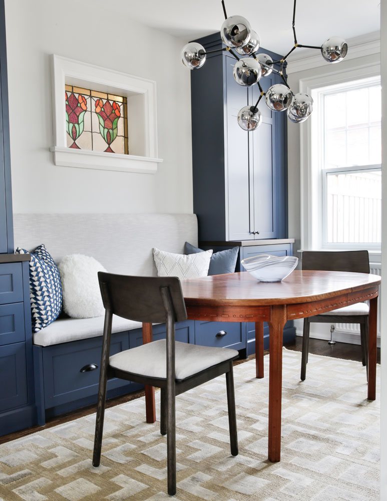 Breakfast nook in dining area is an eclectic blend of old and new.