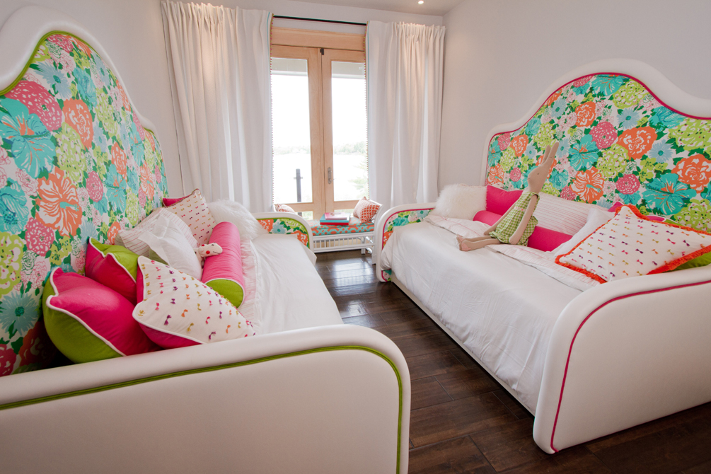 Pink and green kids' room with floral touches.