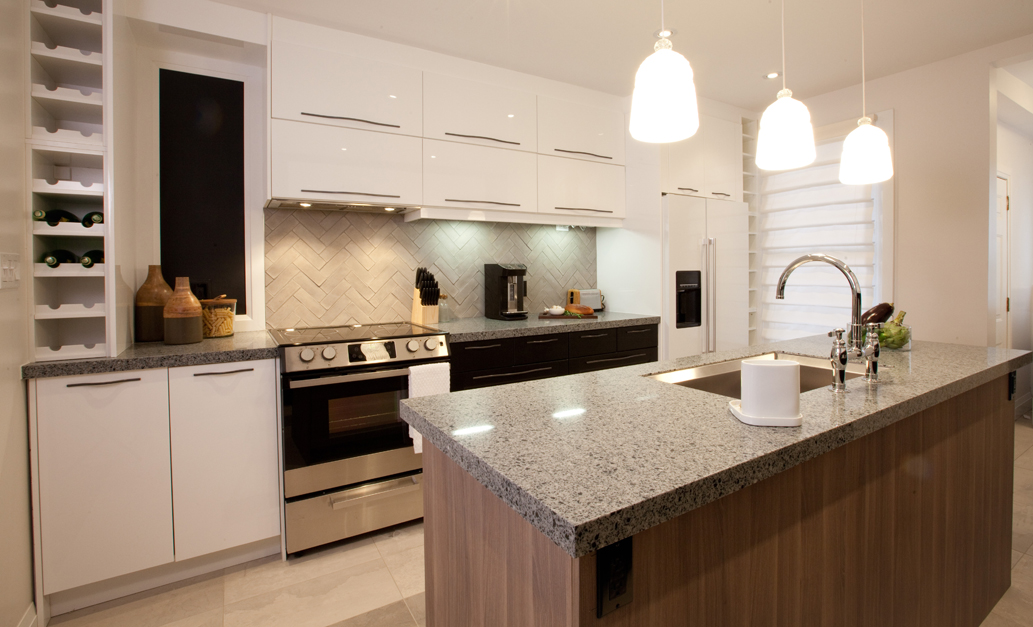 Stylish grey kitchen with textured backsplash