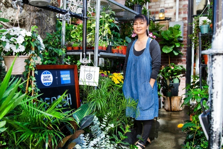 Irene Hickman smiling outside Portland Market with plants