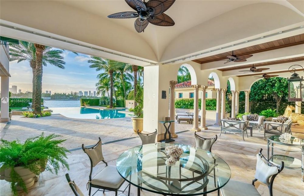 Outdoor dining area on pool deck