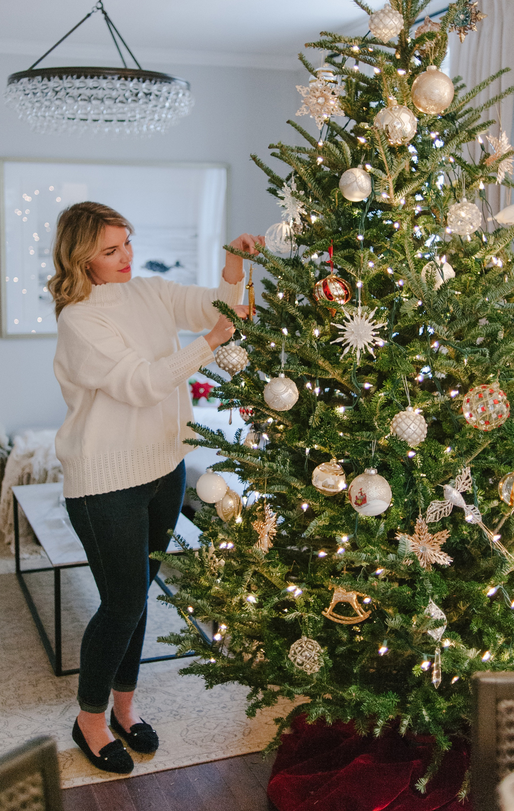 Jacquelyn Clark decorating a christmas tree