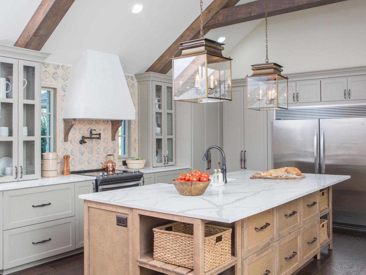 Farmhouse kitchen with wood beams and stylish rustic furnishings.