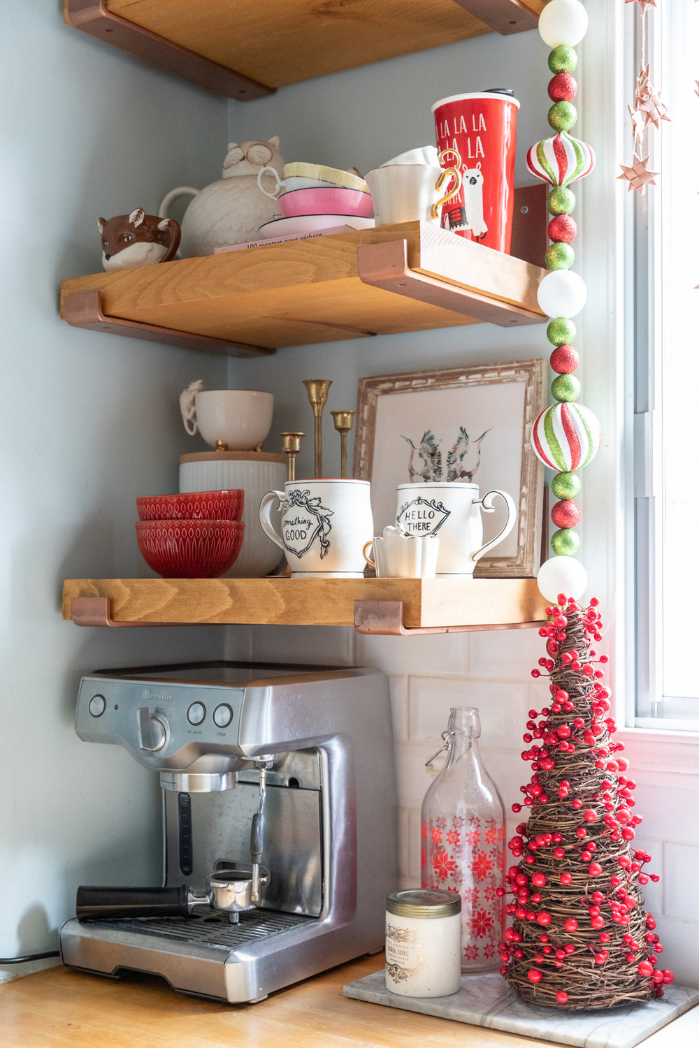 Kitchen countertop with a tiny wicker Christmas tree for decor