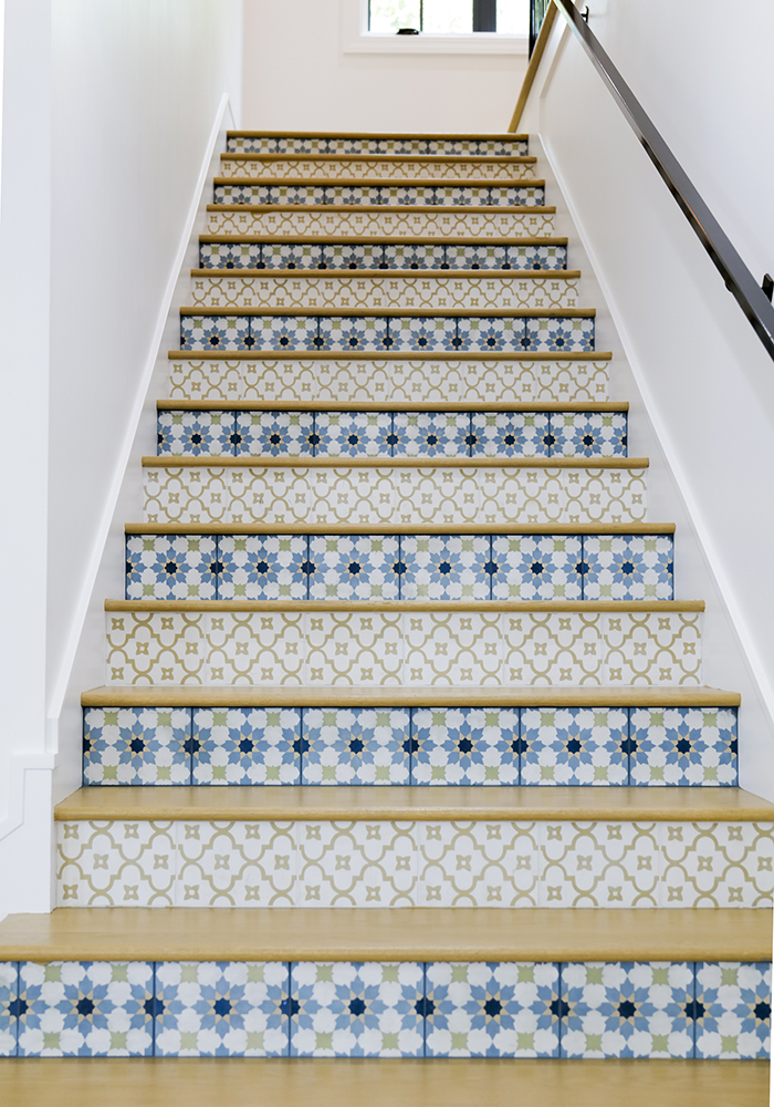 A staircase with Spanish-style tiles