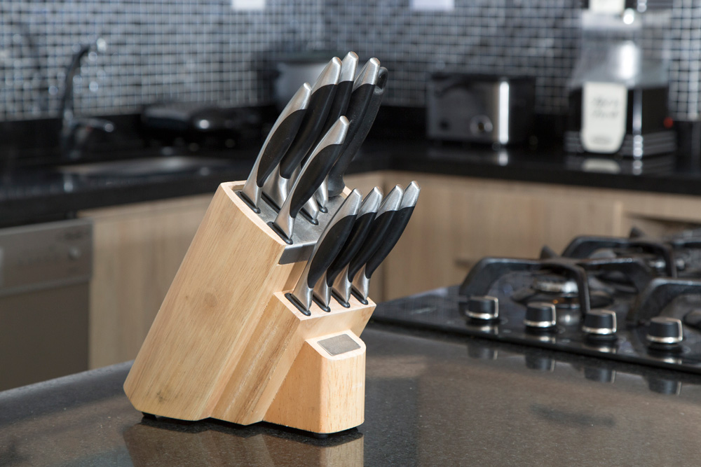 Set of kitchen knives on a counter