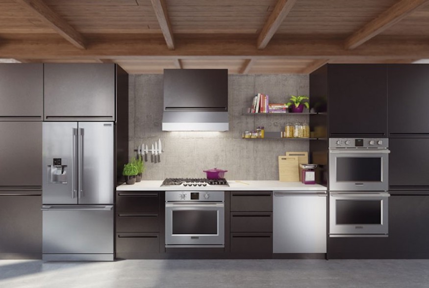 Modern black kitchen with built-in silver appliances