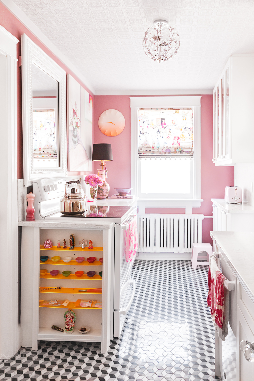 Tiffany Pratt's pink kitchen with geometric floor tiles