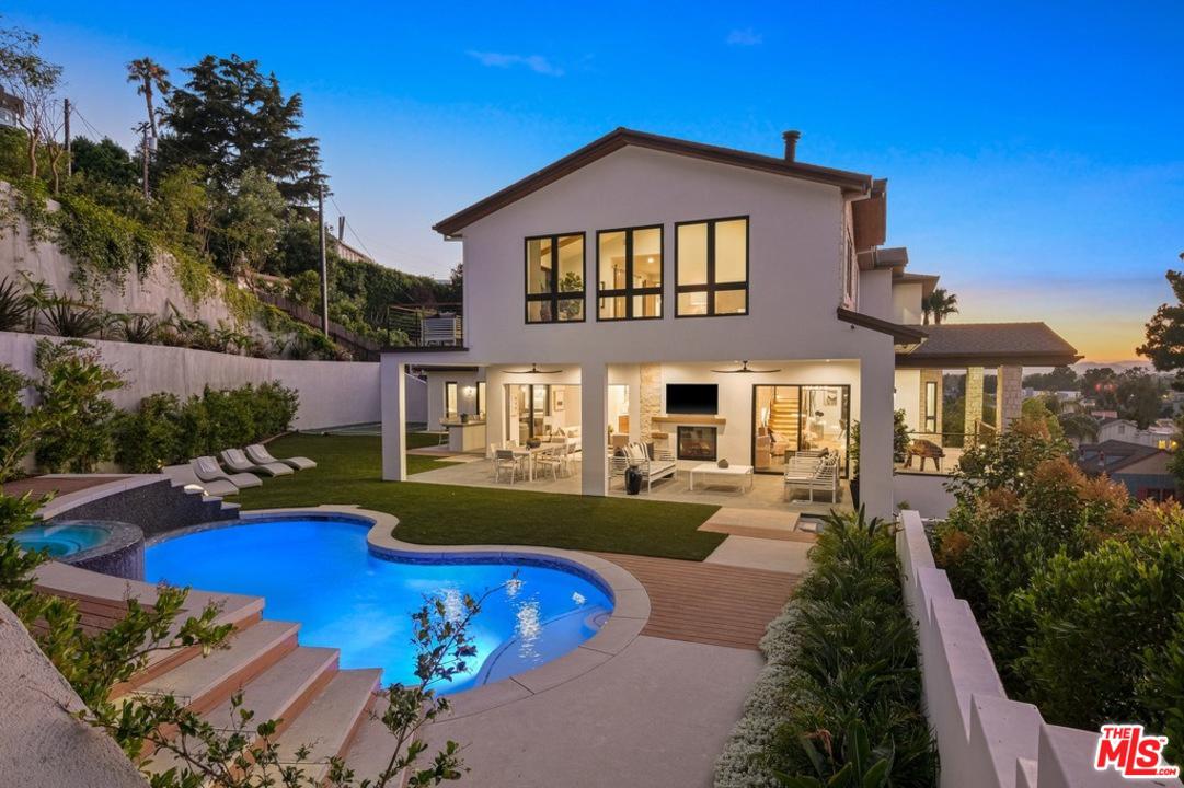 Exterior of home with backyard pool