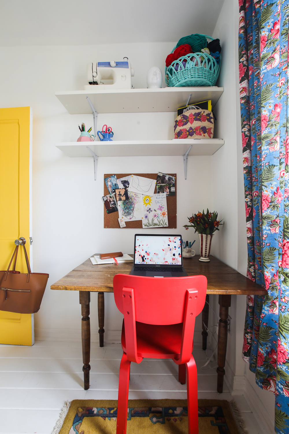 Home office with red chair