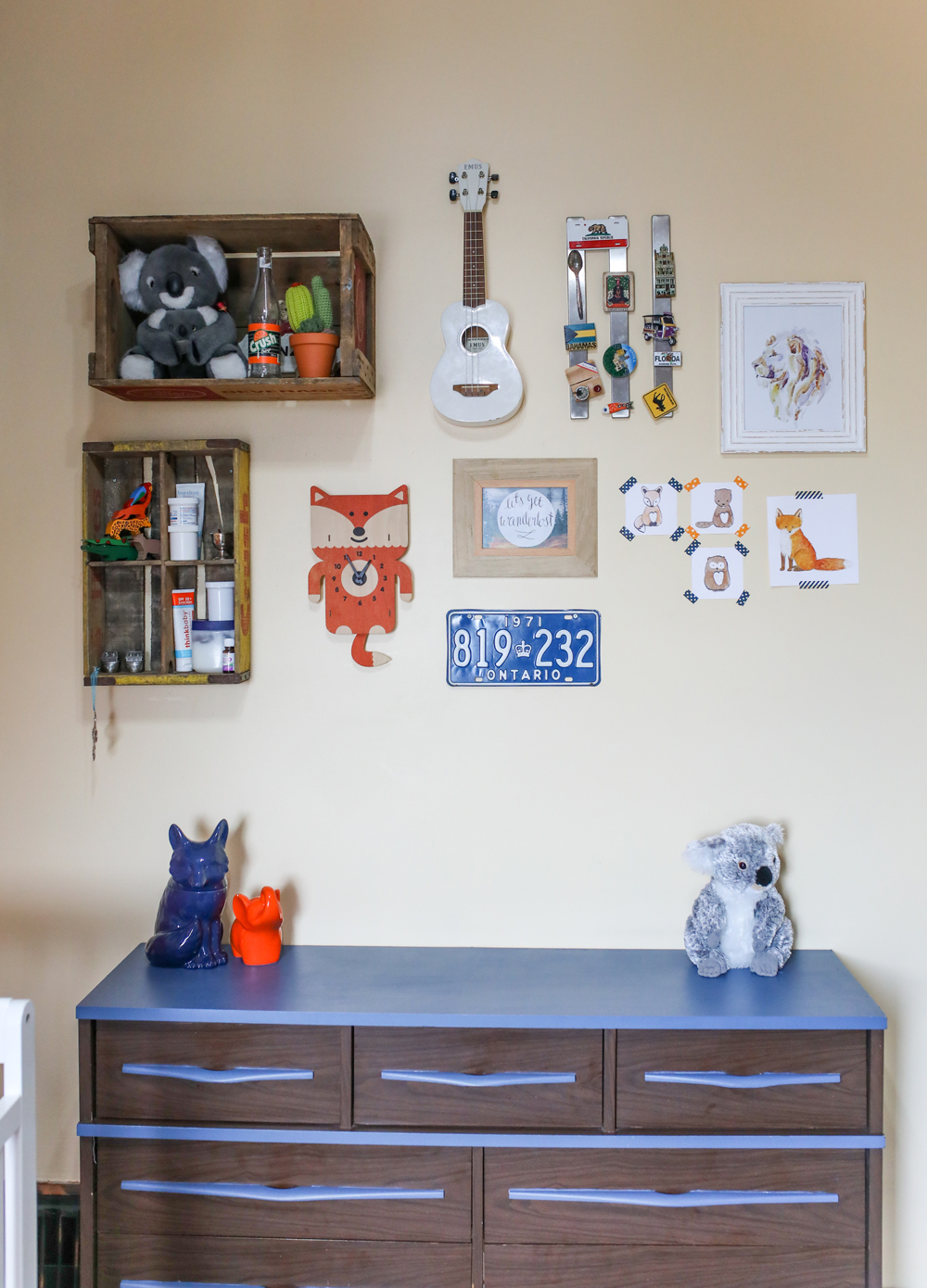 Charming gallery wall in a boy's nursery room