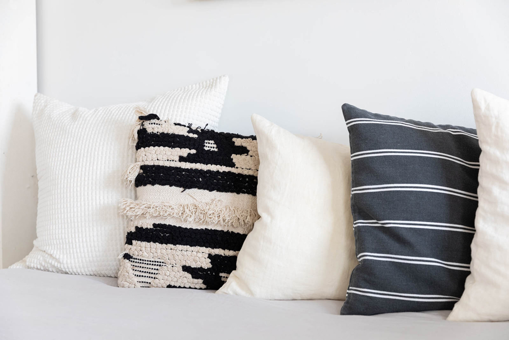 Assorted throw pillows on the daybed