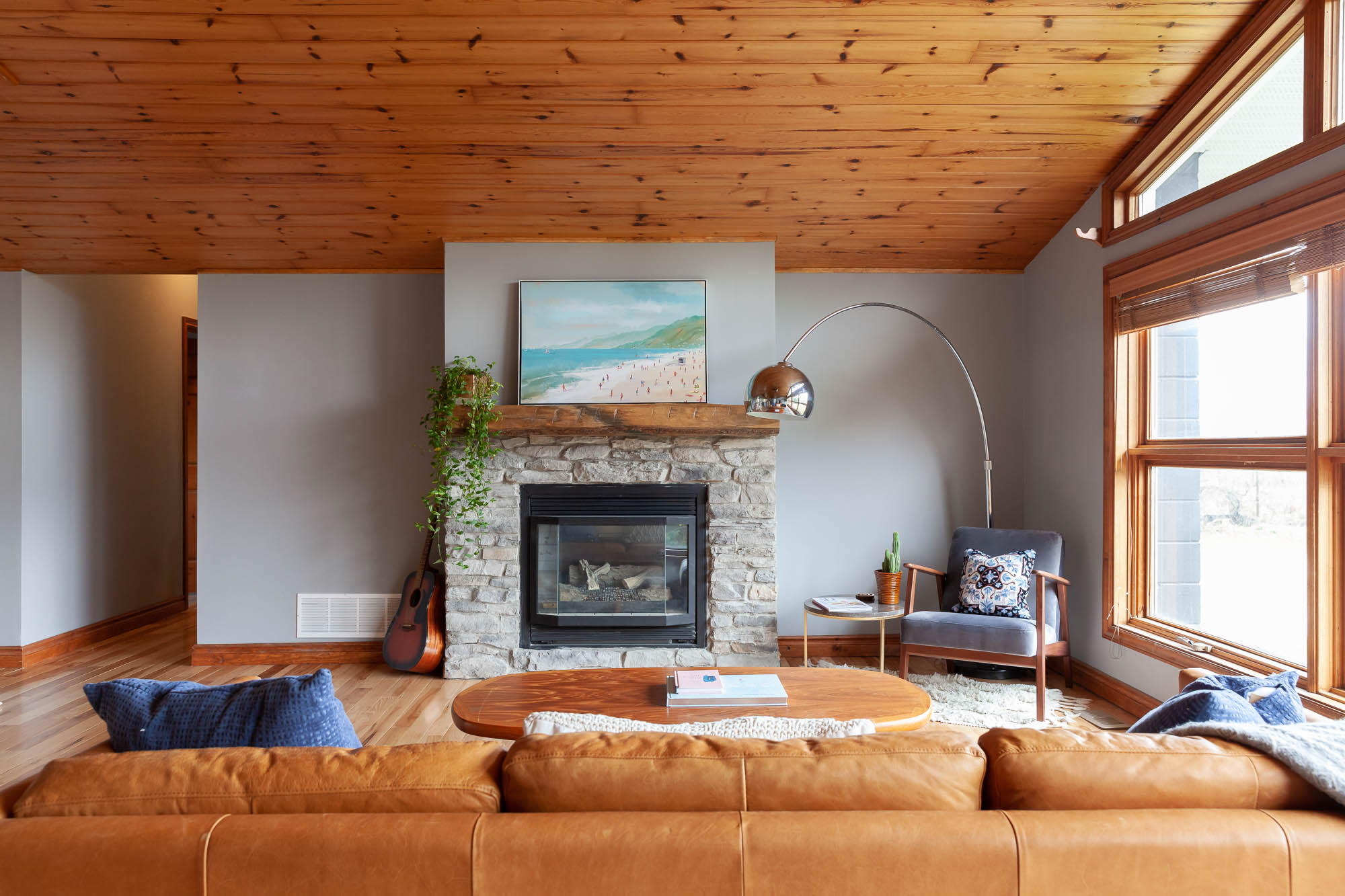living room with brown leather couch in Collingwood, Ontario