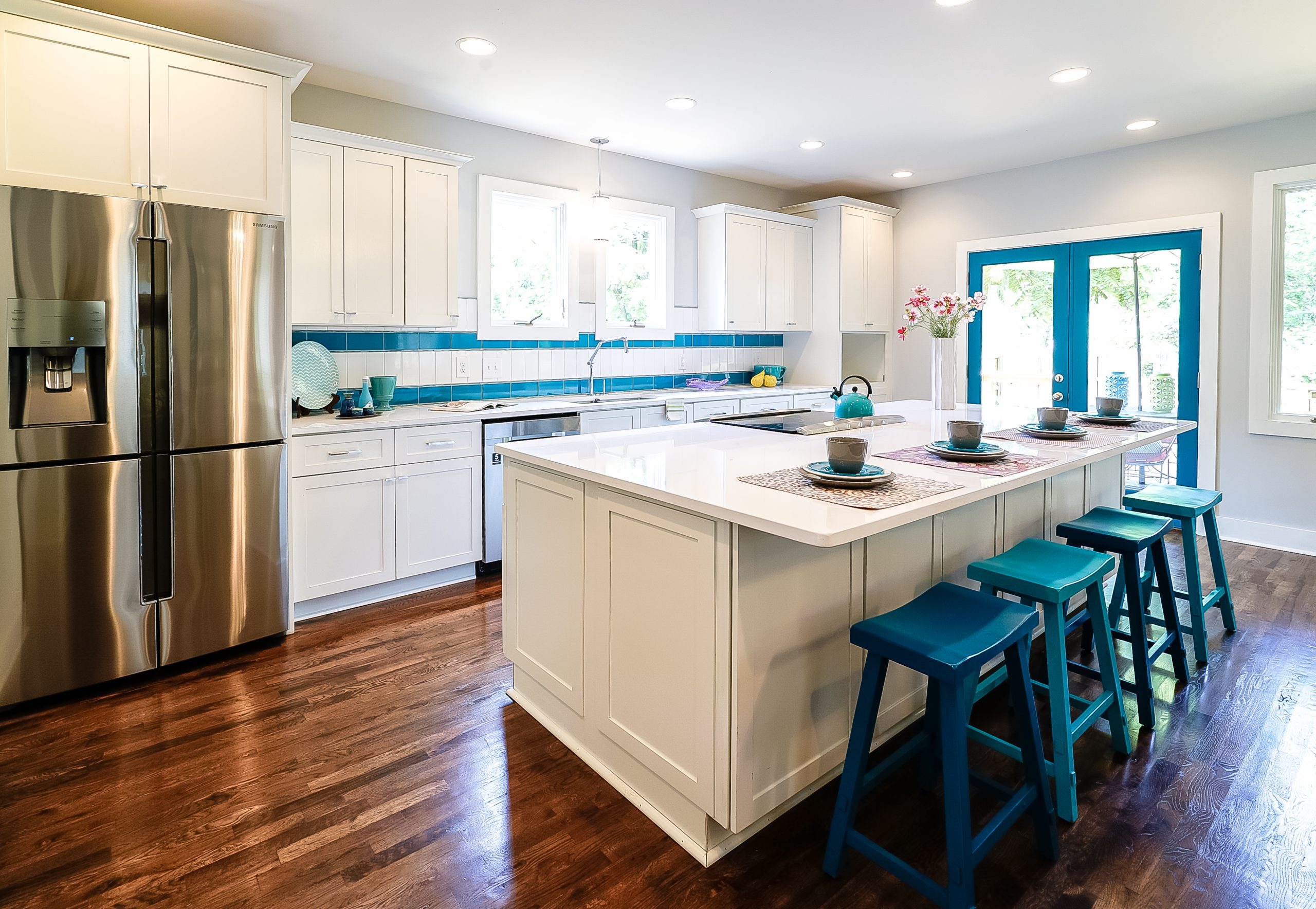 Bright white kitchen with hits of electric blue