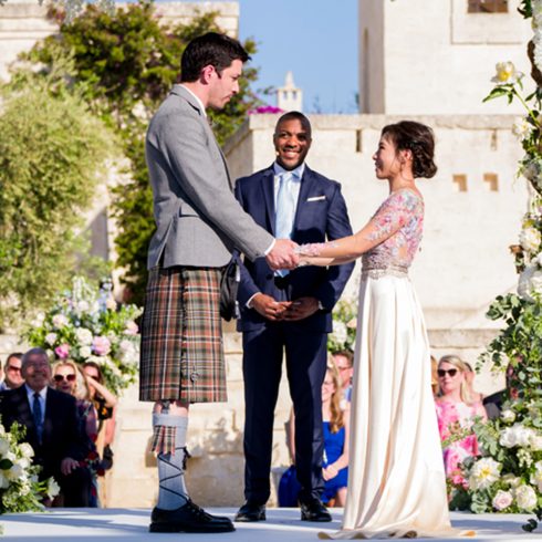 Drew Scott and Linda Phan exchanging vows during their wedding ceremony
