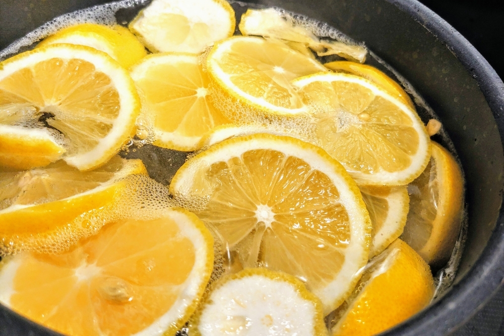 A stovetop simmer of boiled lemon slices