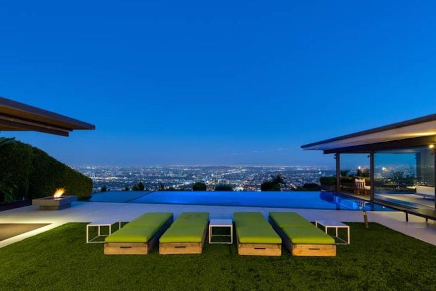 Grassy area and lounge chairs in Matthew Perry's Hollywood Hills home