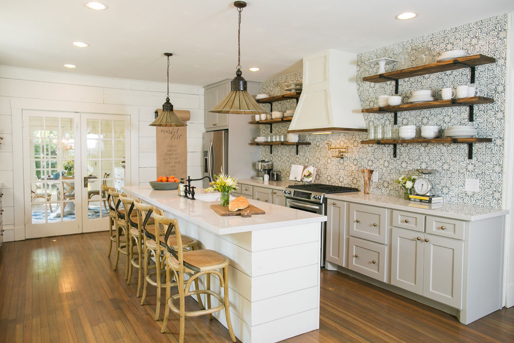 Joanna Gaines' farmhouse kitchen with full wall of vintage-inspired tile.