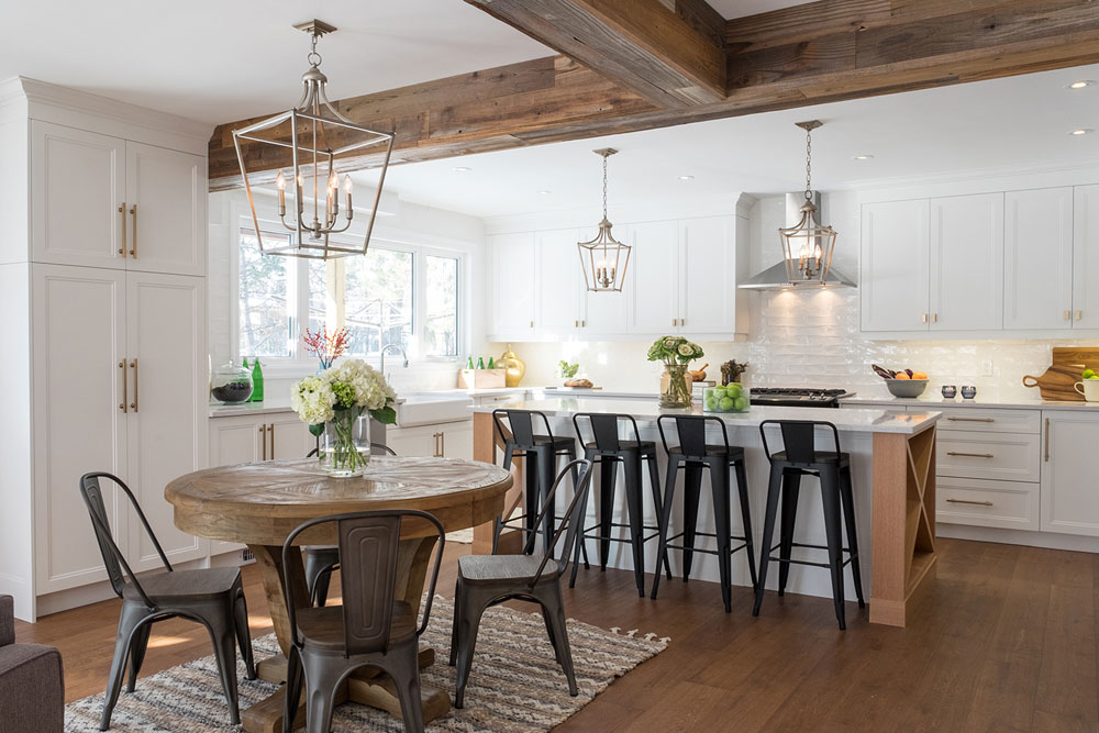 Elegant farmhouse kitchen with wood, white and brass palette.