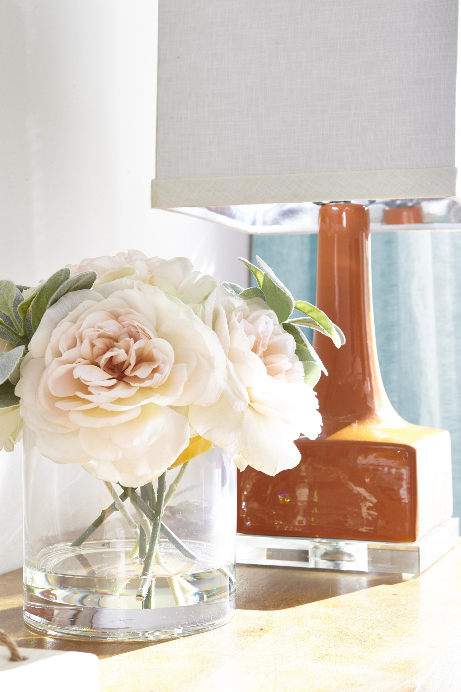 Flowers in vase on console table
