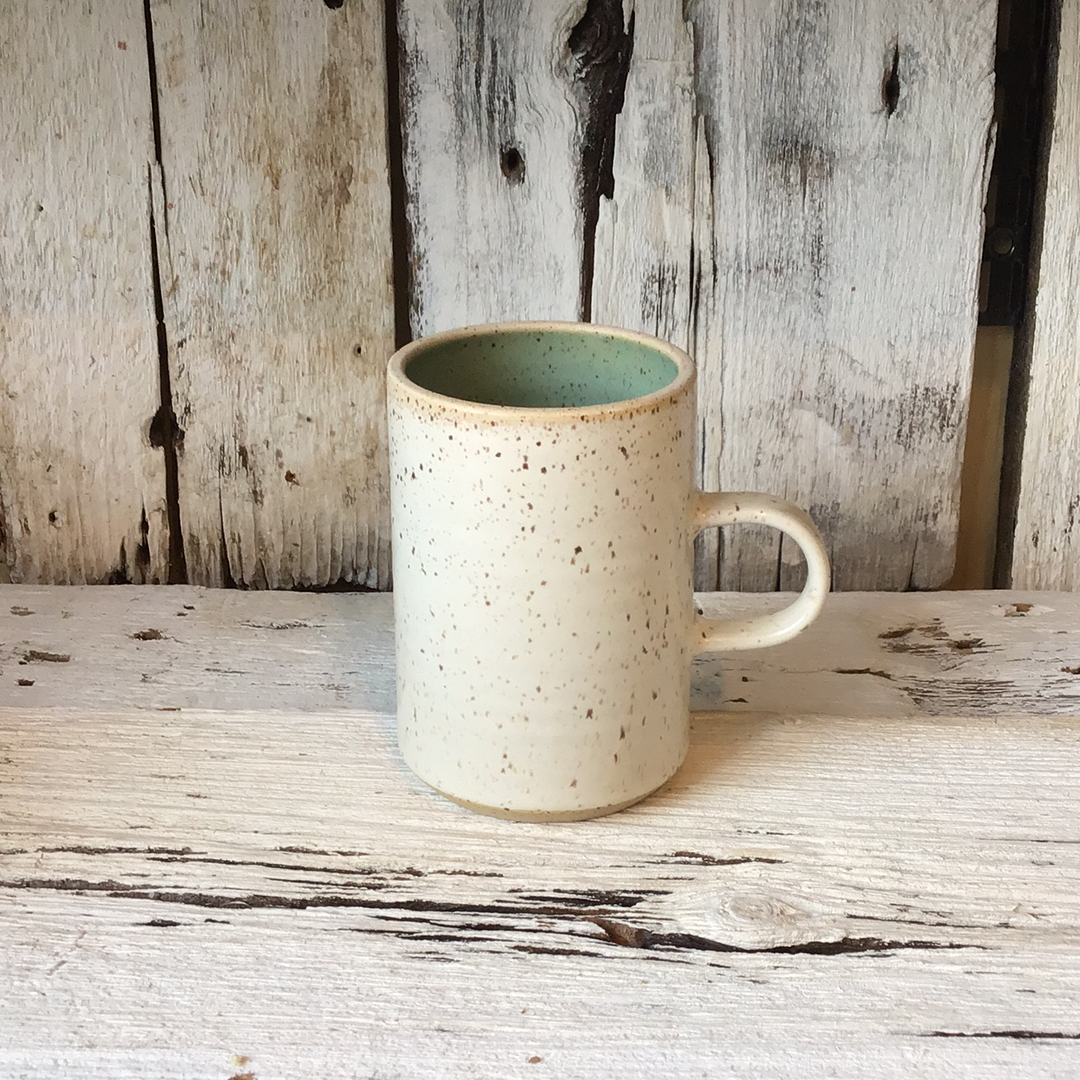 Speckled cream ceramic mug
