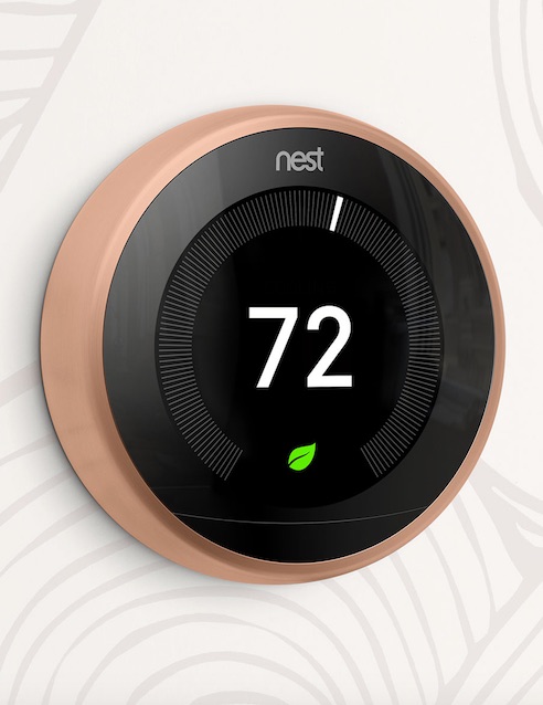 Nest Learning Thermostat mounted on wall