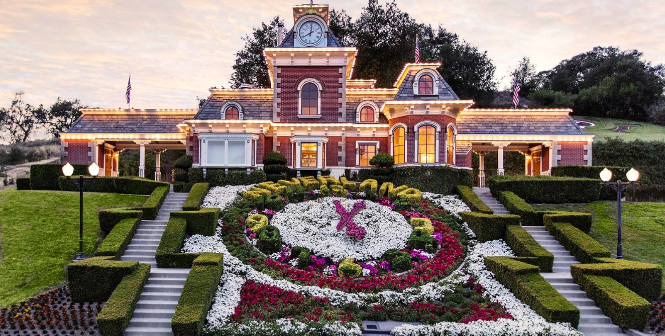 The elaborate entrance of the Santa Barbara Neverland Ranch, featuring a giant clock made of flowers