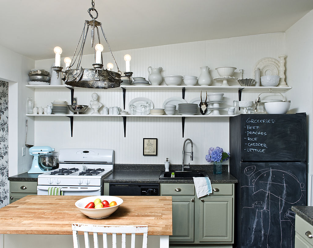 Wall shelving with different kitchen dishes