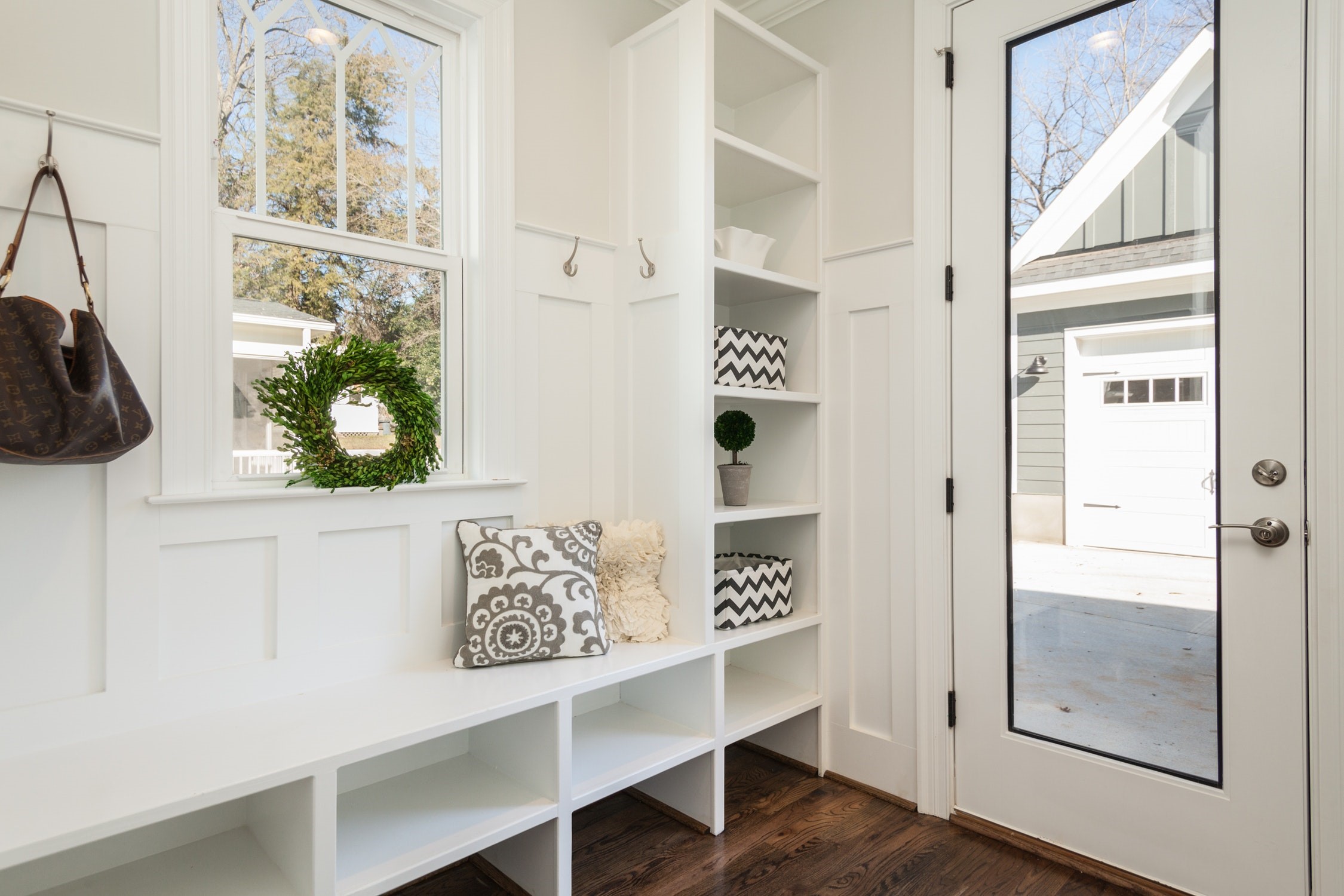 Entryway with white open shelving