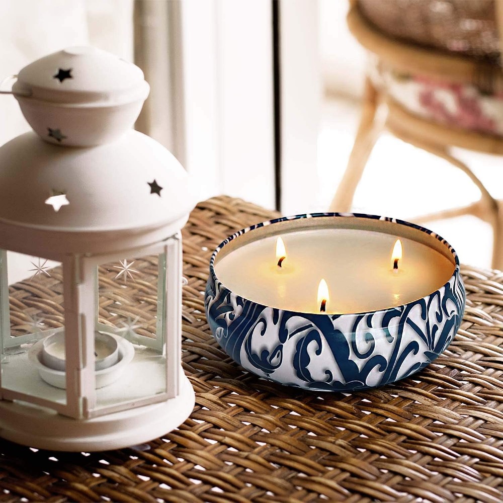 Citronella candle on wicker table