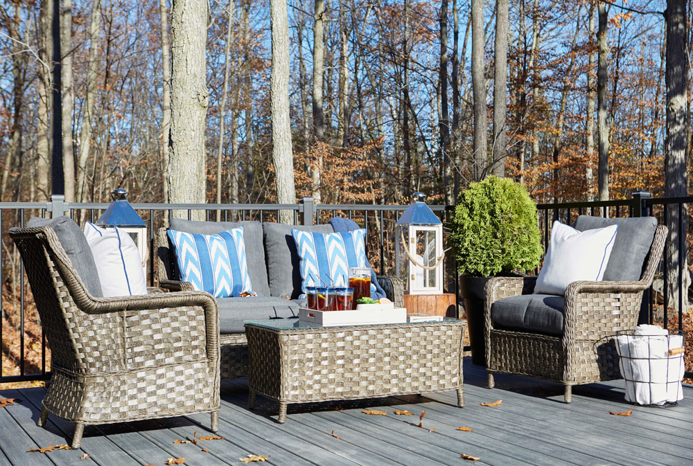 Comfy patio in fall with cushions and blankets