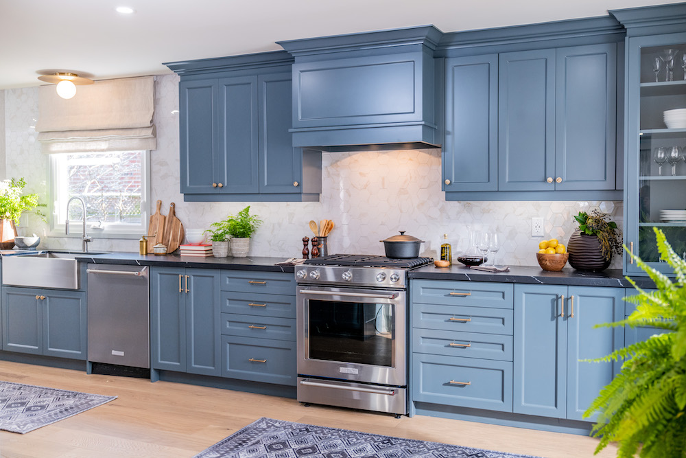 wall of blue cabinets in cozy kitchen