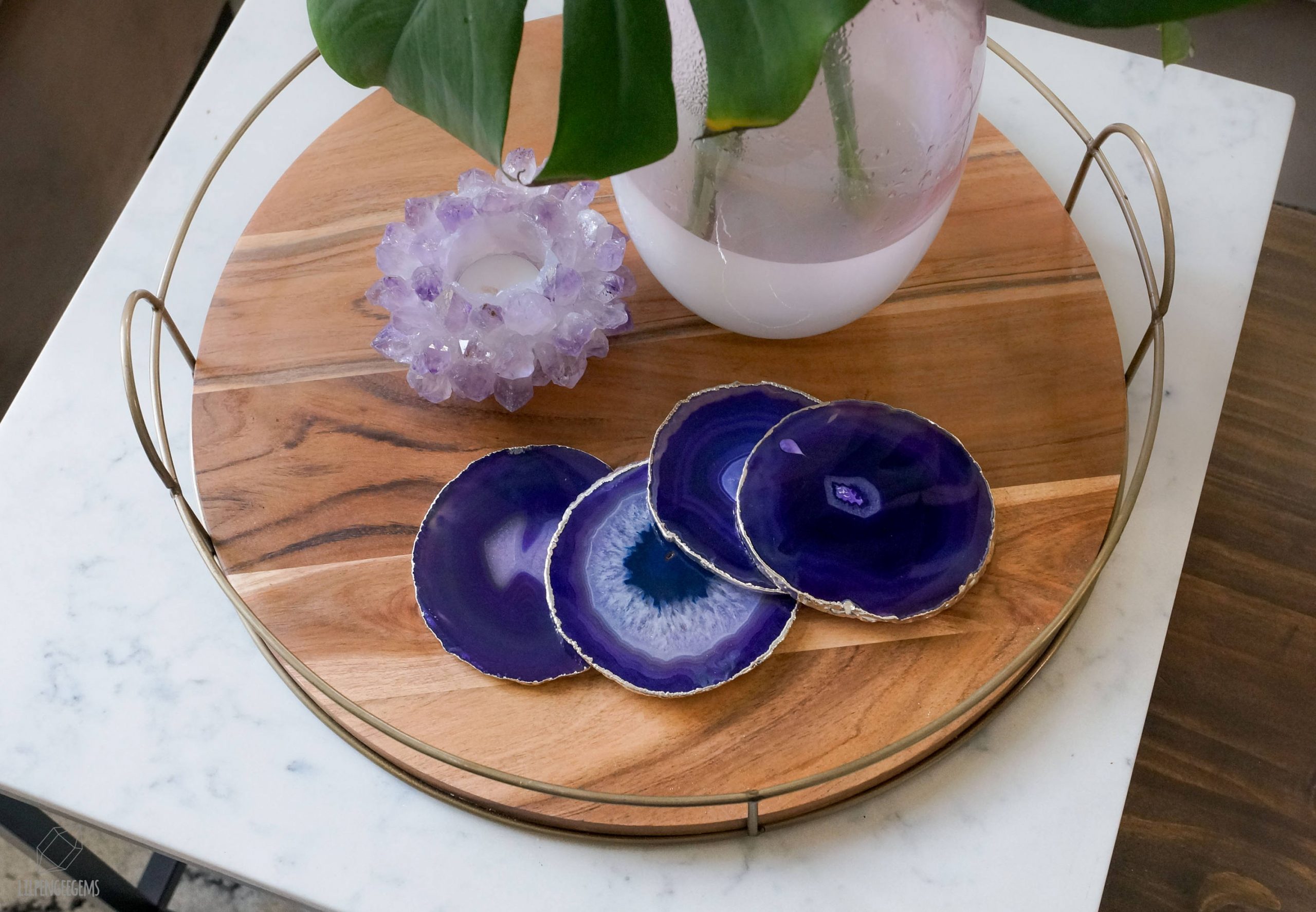 Purple agate coasters on wood tray
