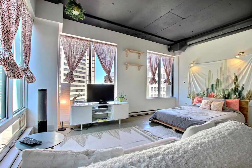 Living/sleeping area in Airbnb minimalist loft