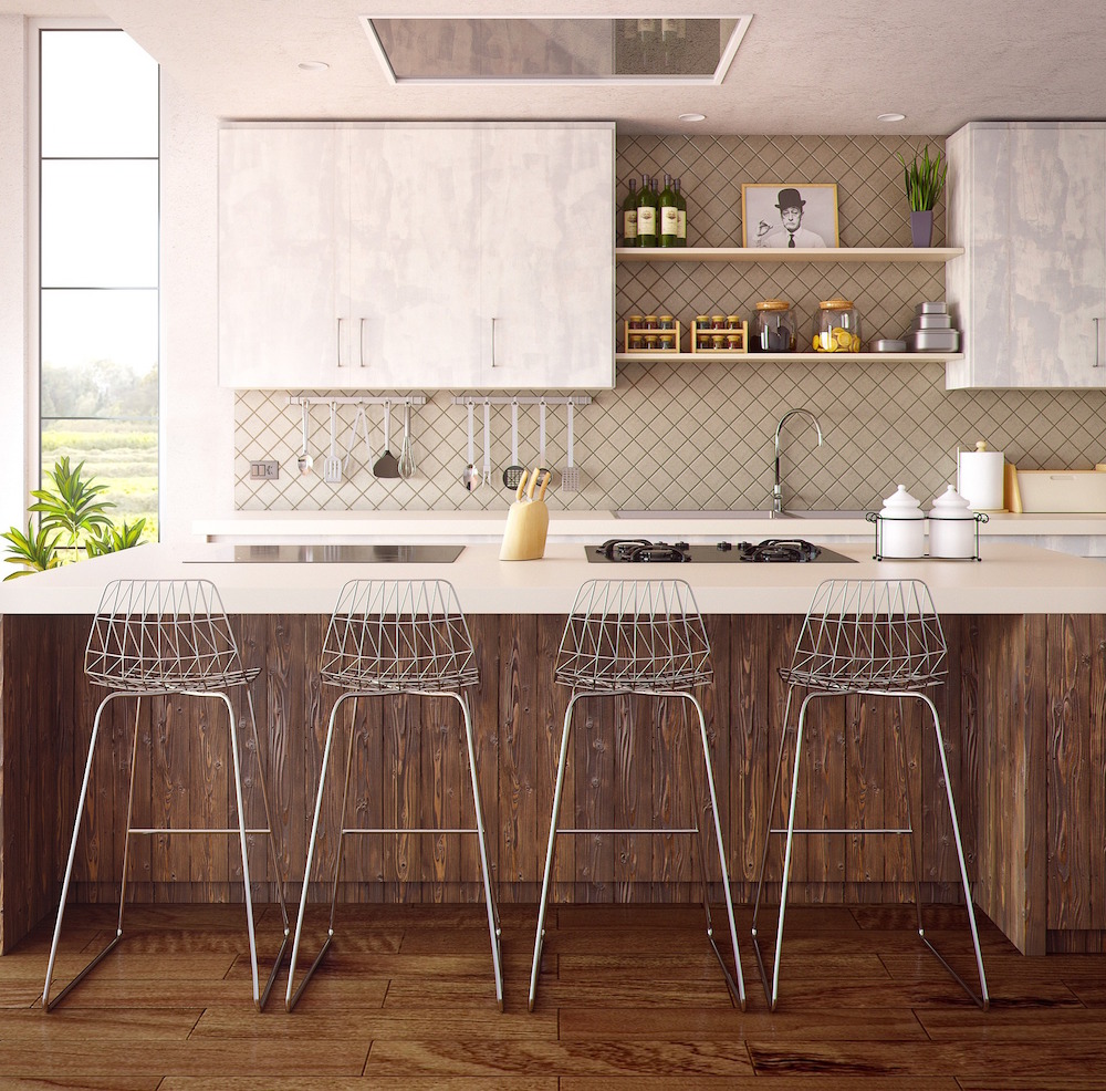 kitchen with a mix of wood cabinets and centre island with wire bar stools