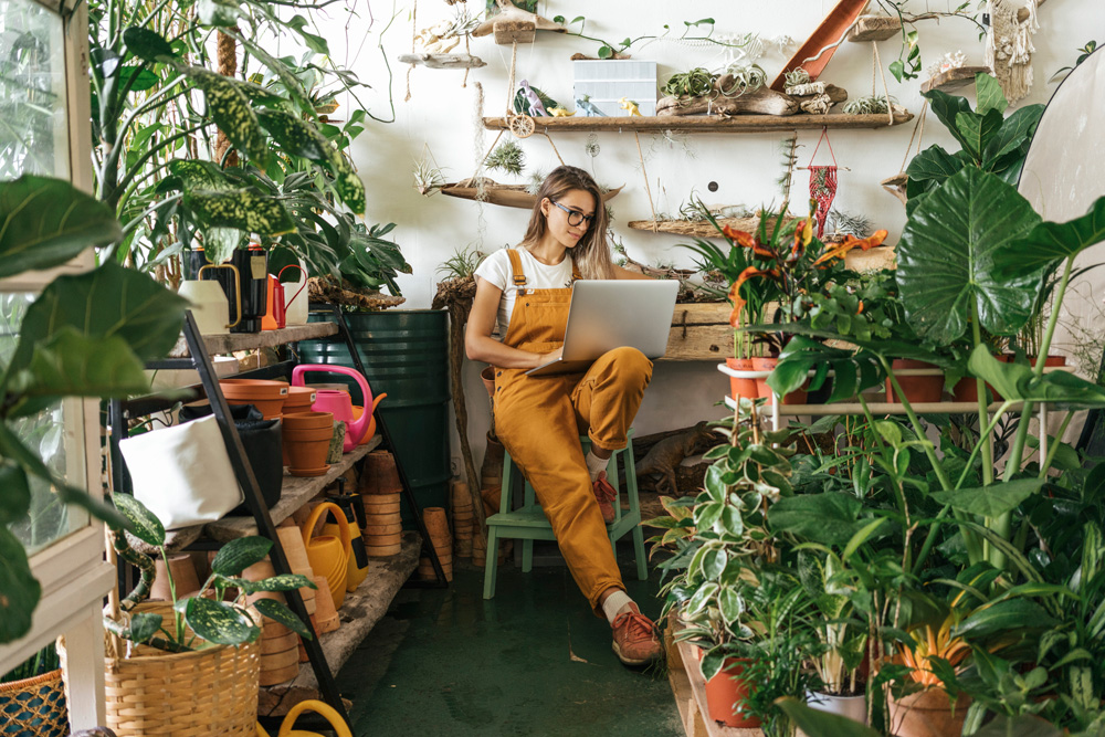 Woman surrounded by plants