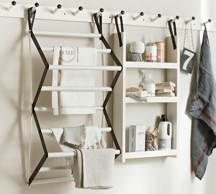 Rack, rail and peg laundry shelf