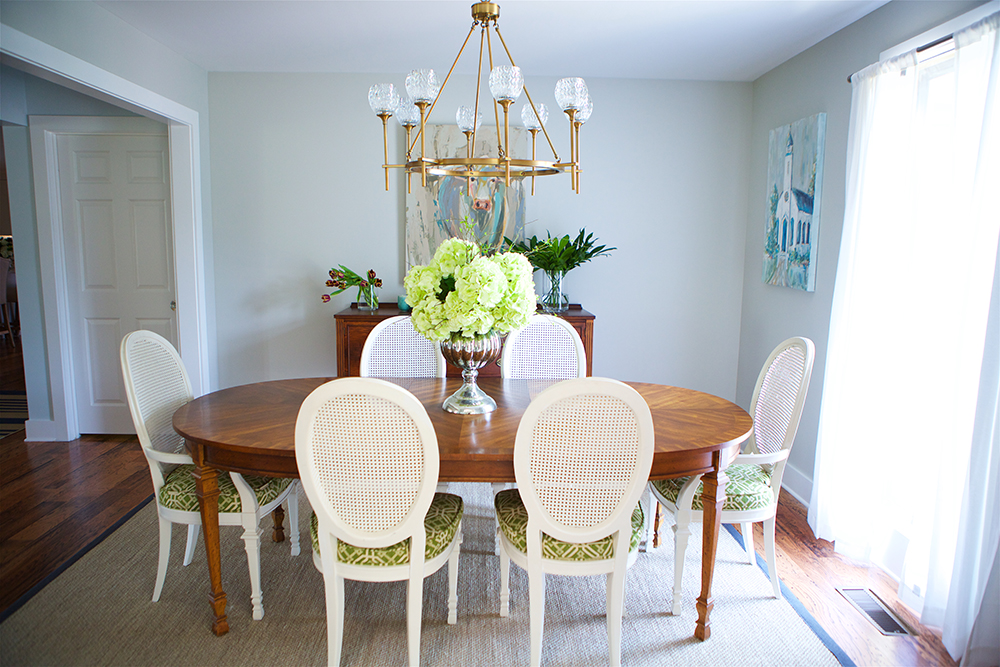 Feminine dining table with glam chandelier