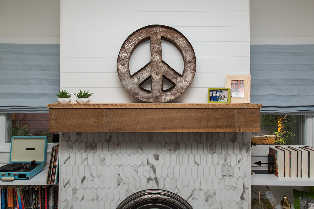 Peace sign on fireplace mantel