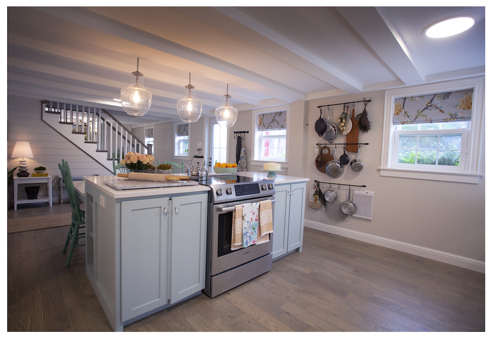open-concept kitchen with pale-blue centre island