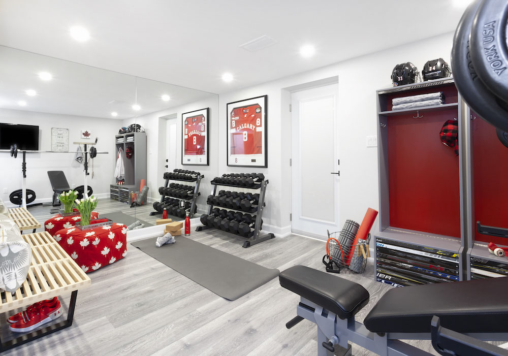 Home gym with red accents
