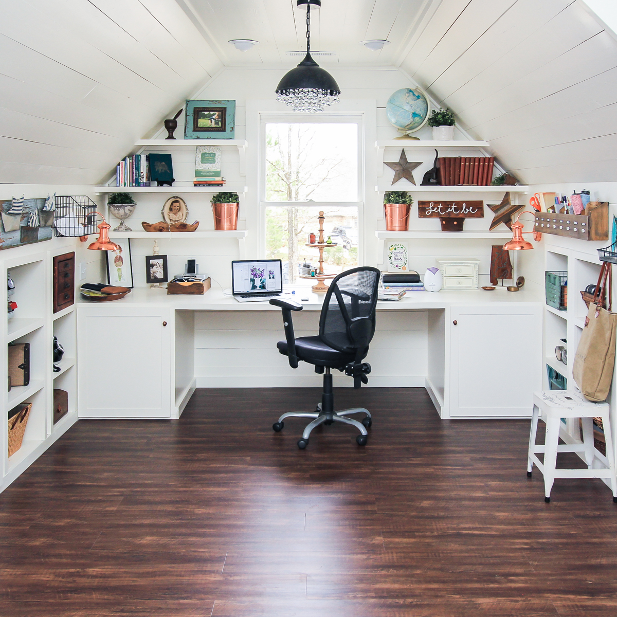 Shabby-chic attic work space with shelves