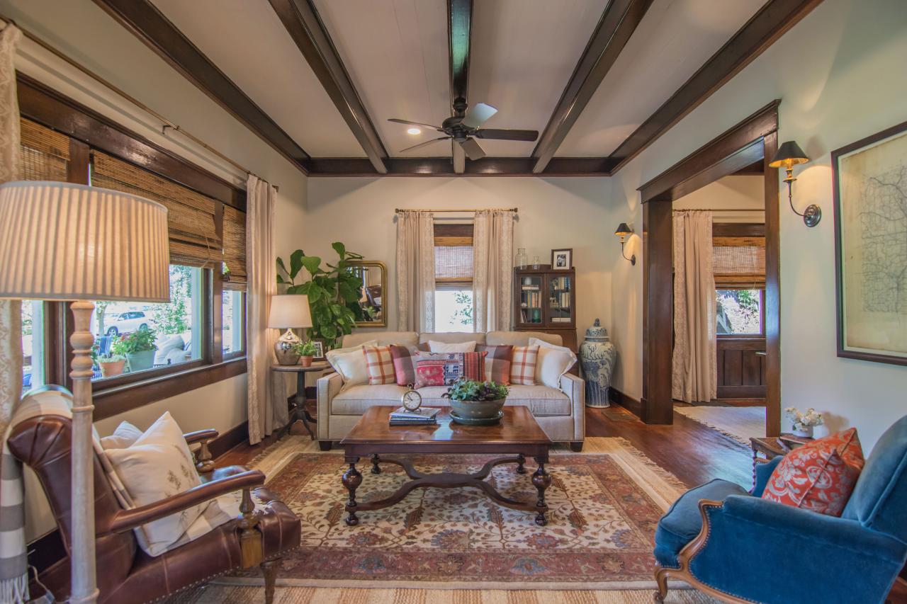 Living room wood beams on ceiling and antique decor