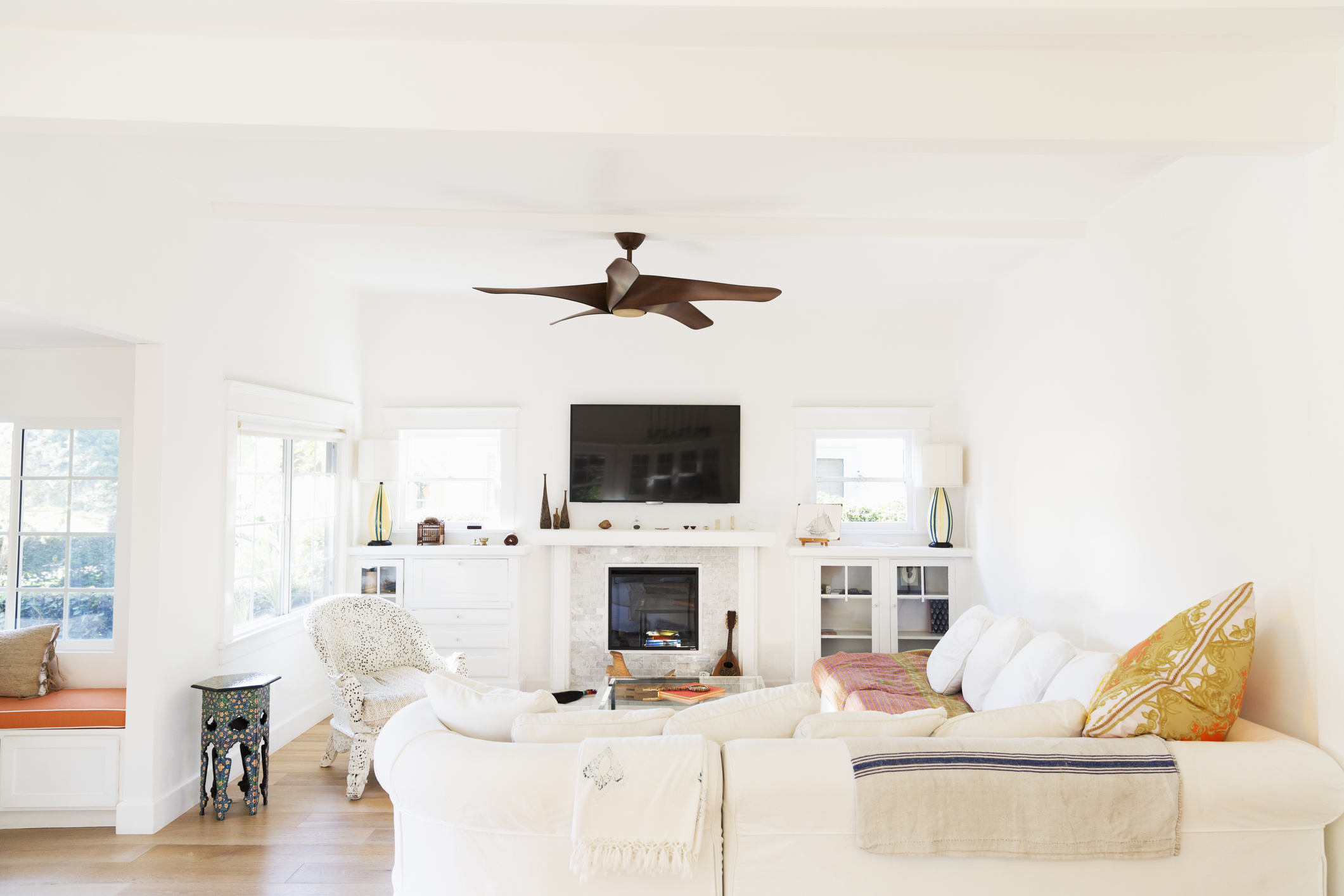 White Living room with ceiling fan